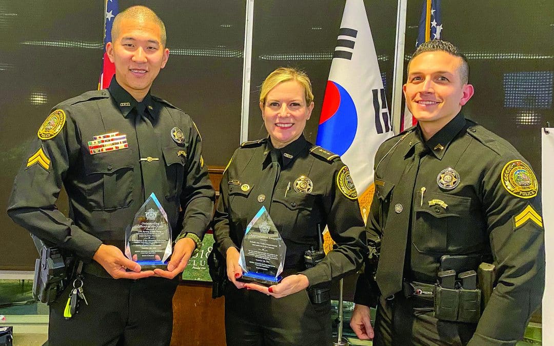 Corporal Byung Kang, Chief Jacquelyn Carruth and Corporal Ted Sadowski receive the awards from Georgia Advocates for Crime Prevention in December.