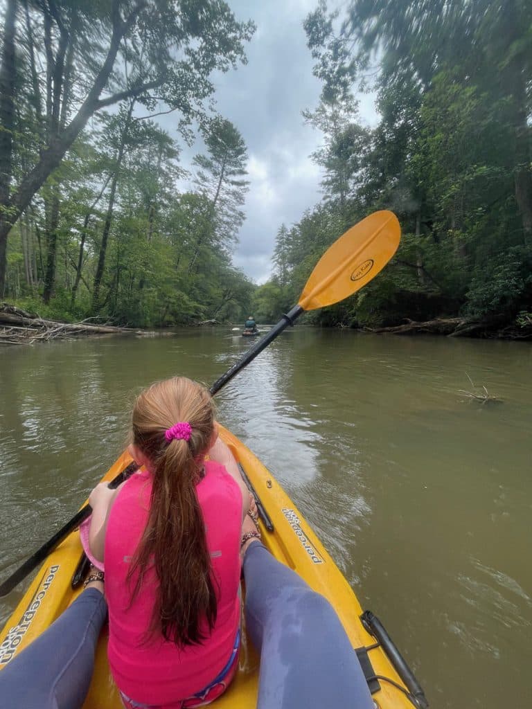 little girl in a kayak