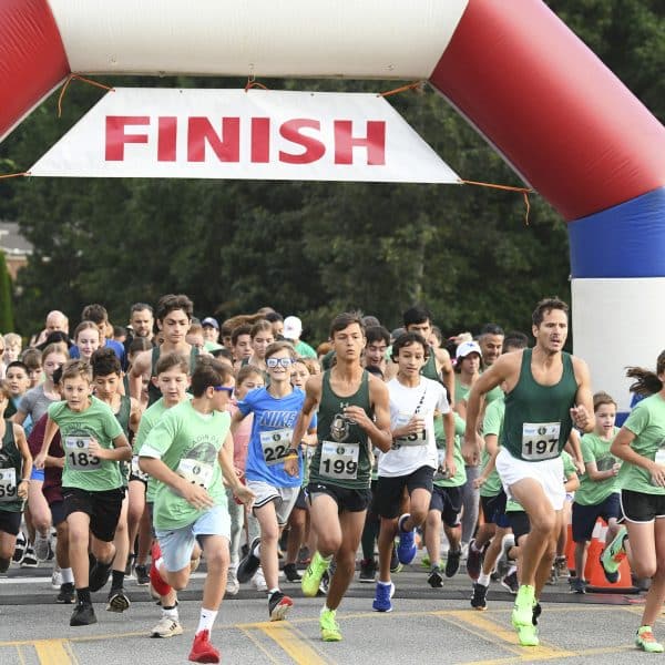 Group of runners participating in a 5k race