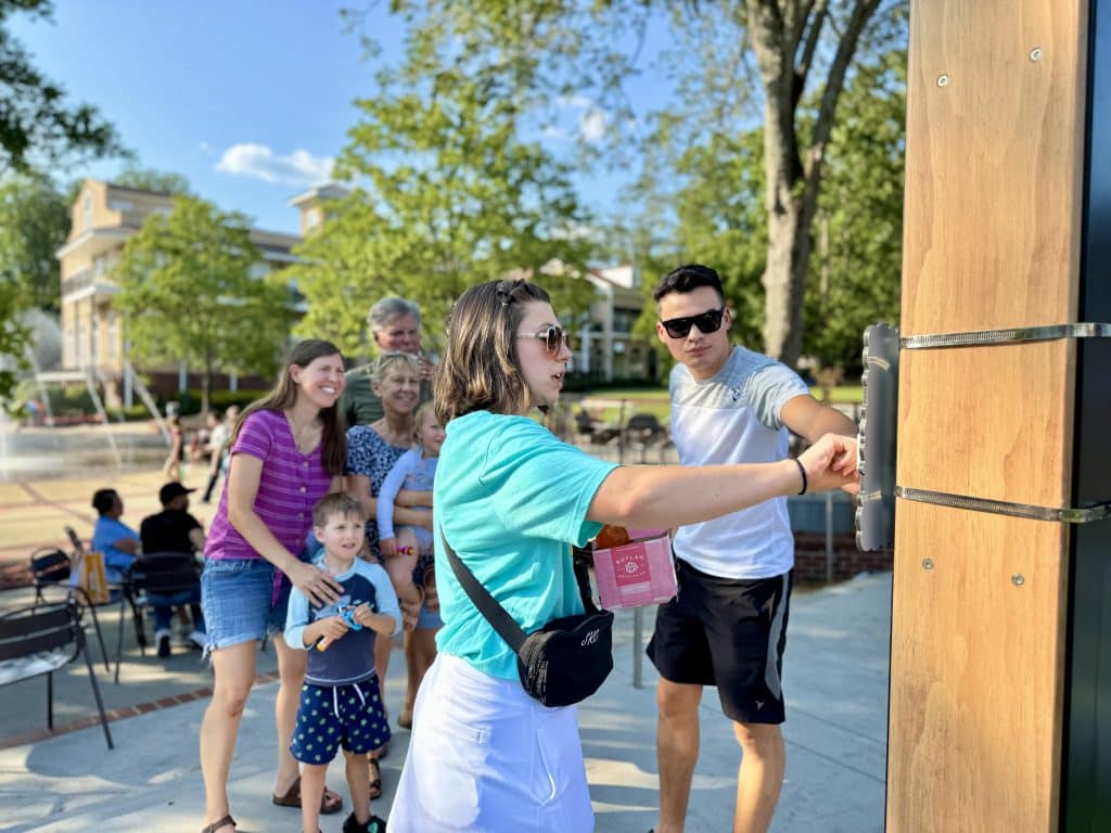 Family using one of downtown Duluth's selfie stations