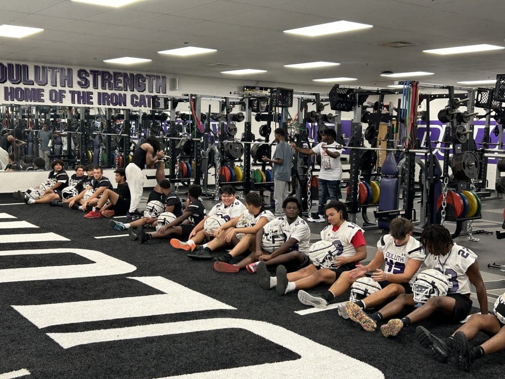 high school football team in training room