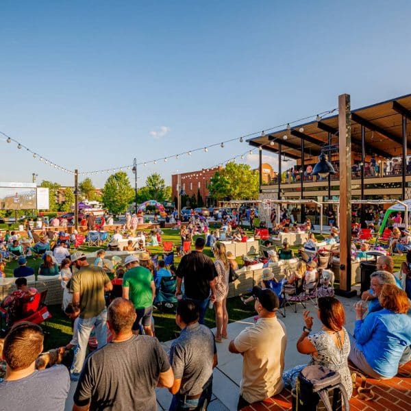 Crowd of people at an outdoor show in downtown Duluth, GA