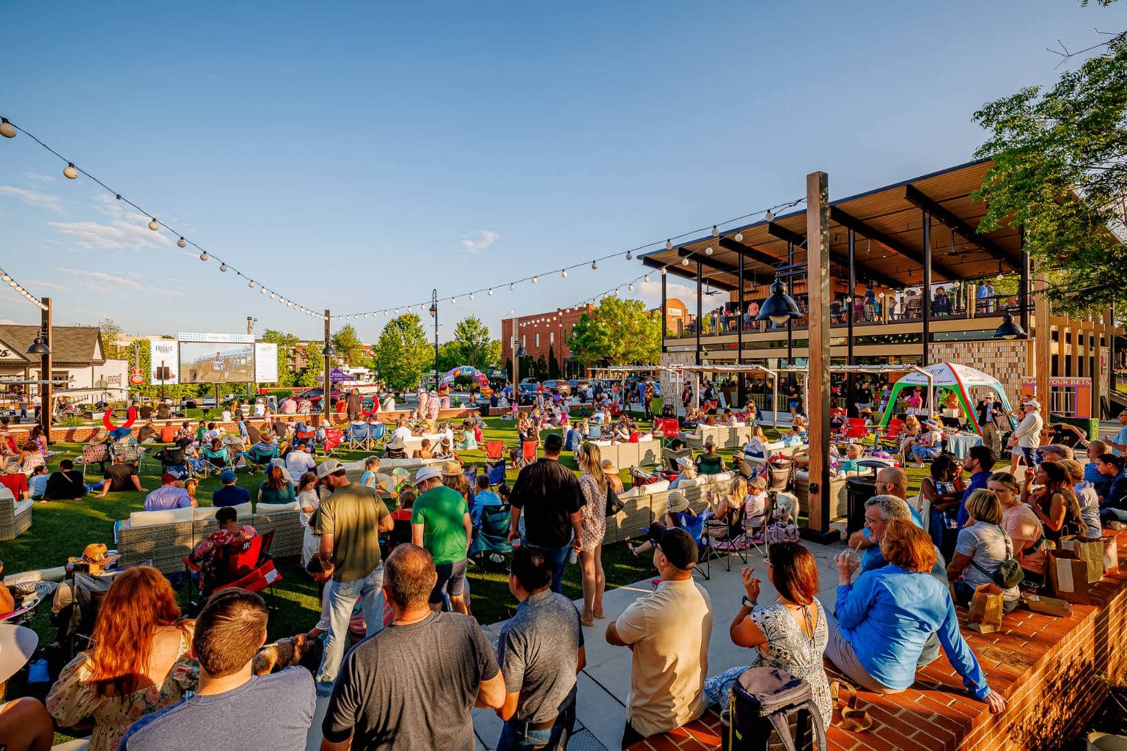 Crowd of people at an outdoor show in downtown Duluth, GA