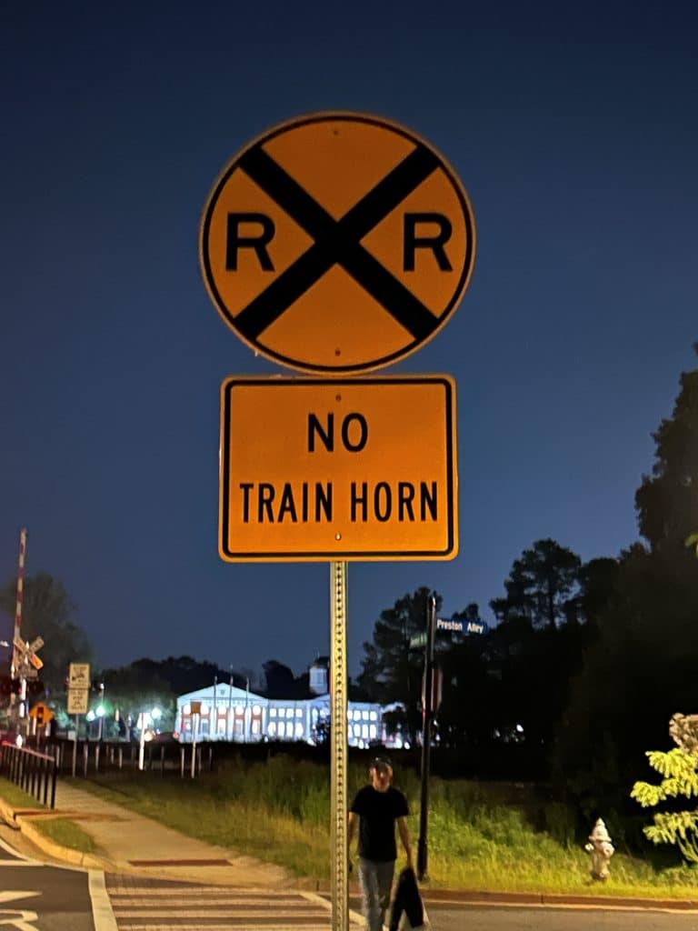 No Train Horn railroad crossing sign