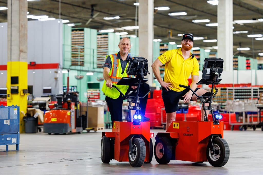 interior of Toyota facility with two employees