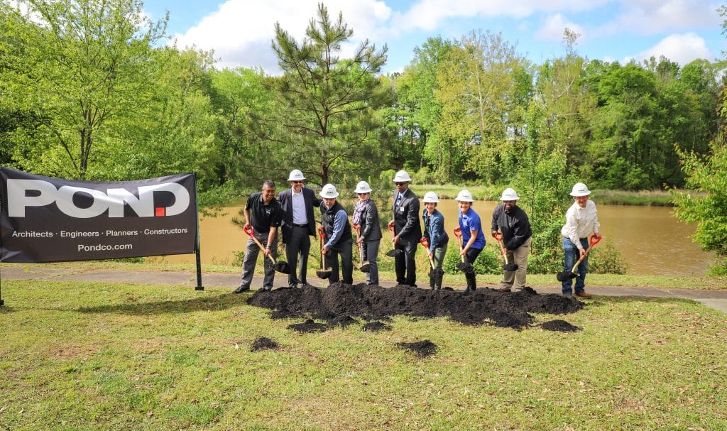 group of people at a groundbreaking ceremony