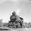 black and white photo of an old shortline train