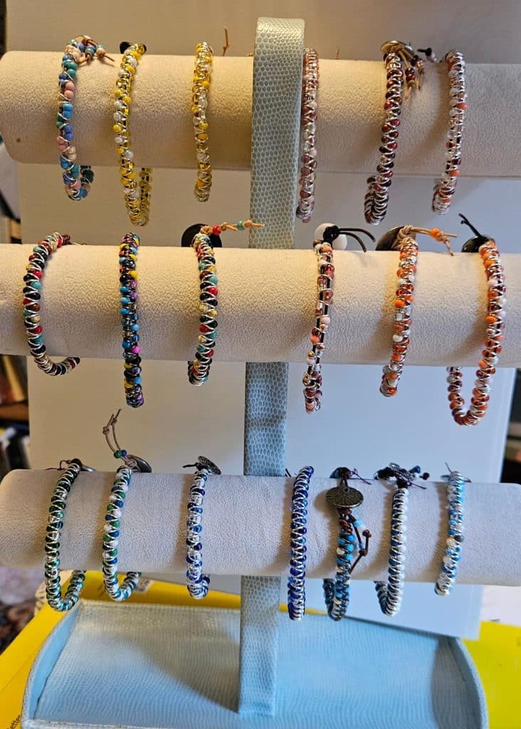 a display of beaded bracelets