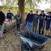 people volunteering for a community cleanup day