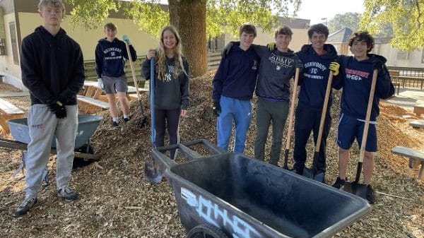 people volunteering for a community cleanup day