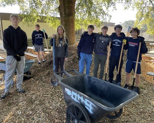 people volunteering for a community cleanup day