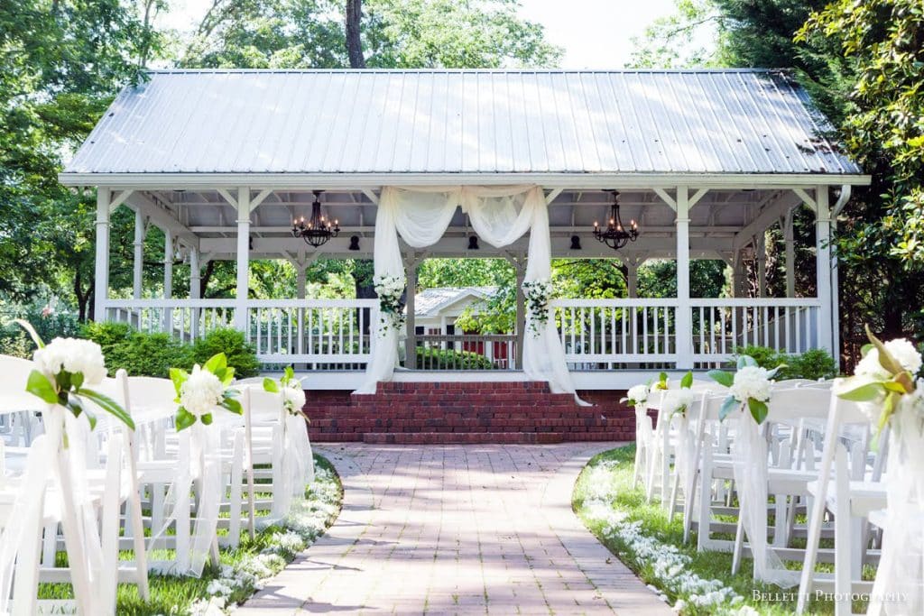 outdoor wedding venue with pavilion and chairs