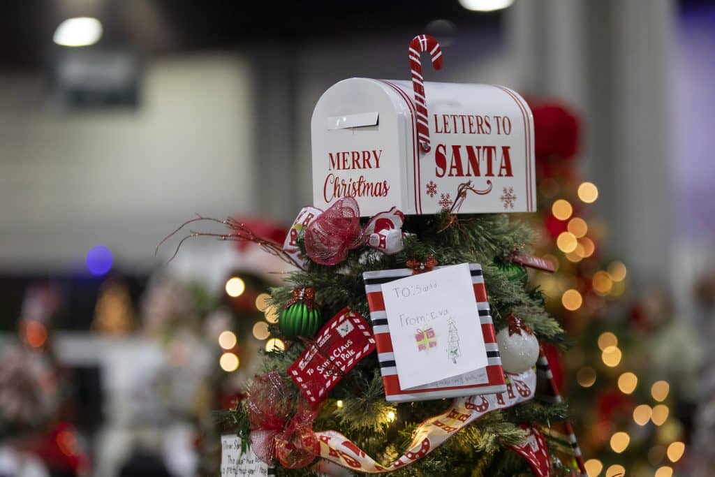 Santa's mailbox display decorated in ribbon and lights at the Georgia Festival of Trees