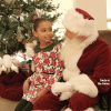 Santa with child at Christmas