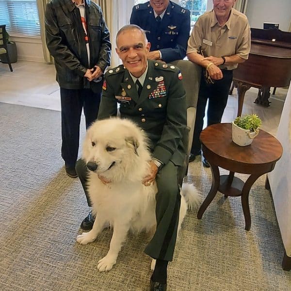 US Military veteran with his dog at an event