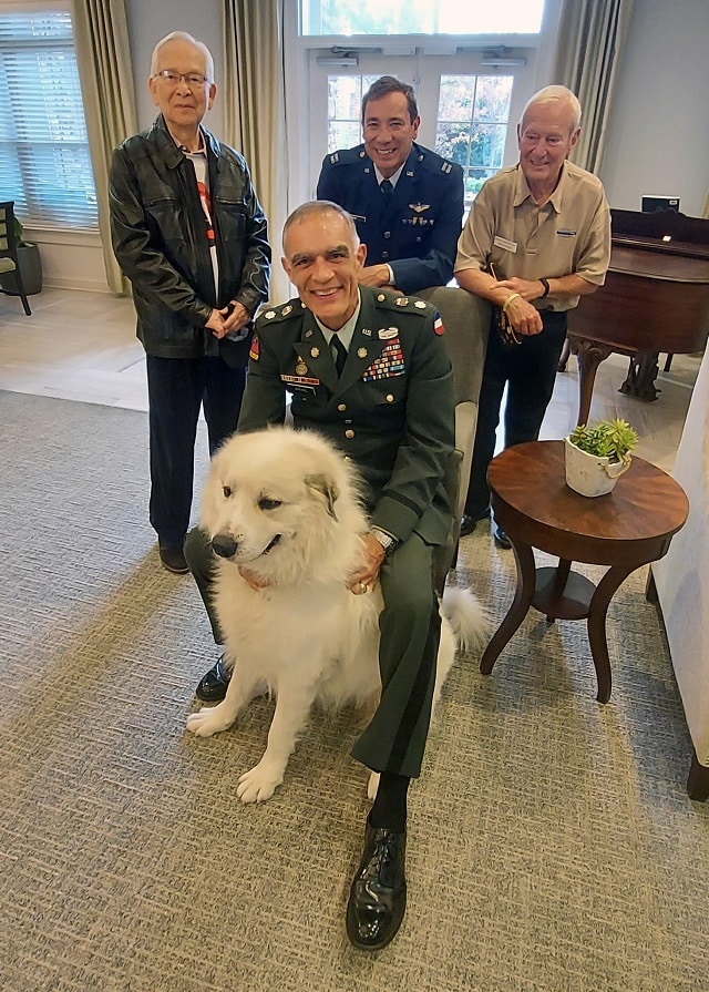 US Military veteran with his dog at an event