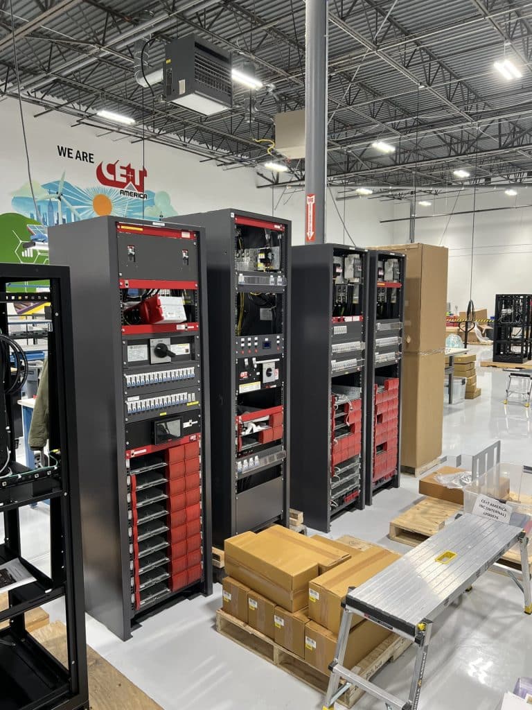 A row of equipment in a very clean manufacturing facility.