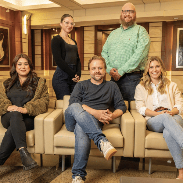 Lawyers and staff from a metro Atlanta lawfirm in the reception area of their office