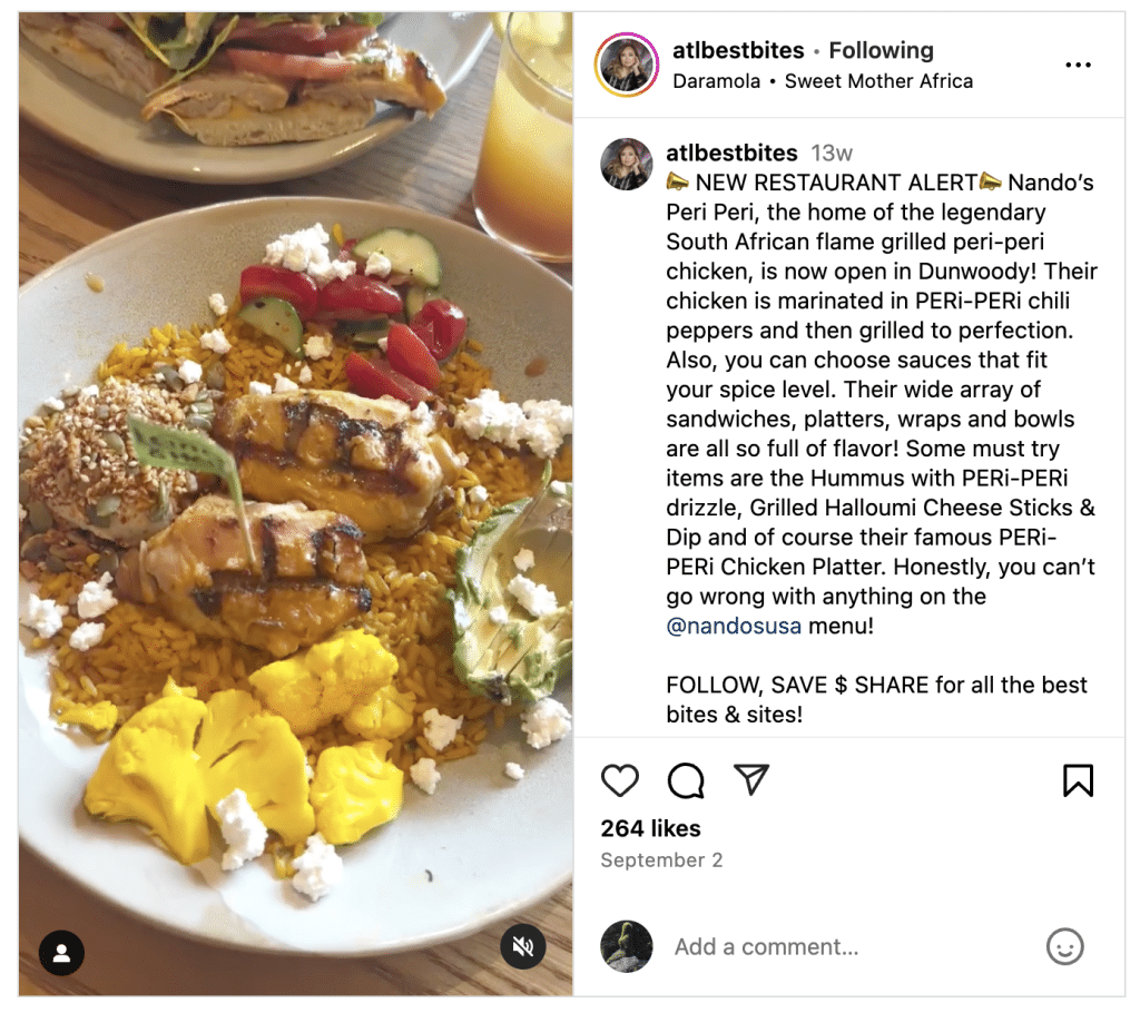 Instagram screenshot of a plate of food, next to a smaller plate of food and a drink, on a brown table at Nando's PERi-PERi restaurant