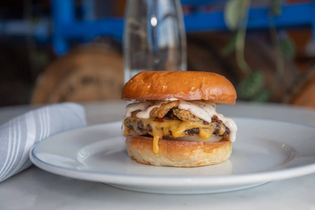 a burger on a white plate