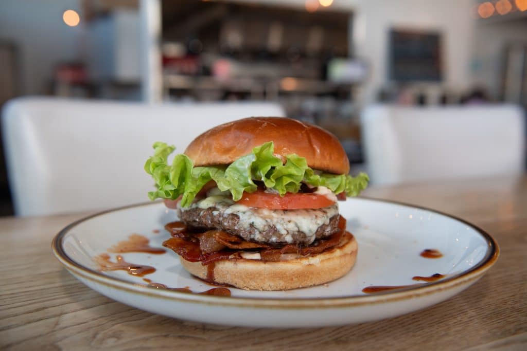 A burger on a white plate