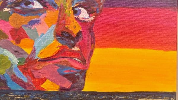 A multi-colored oil painting of a face against a purple, red and yellow-orange background. The color palette is all deep reds and golds with a few light blues.